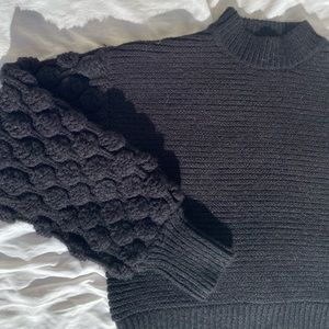 francesca’s black sweater with chunky sleeves